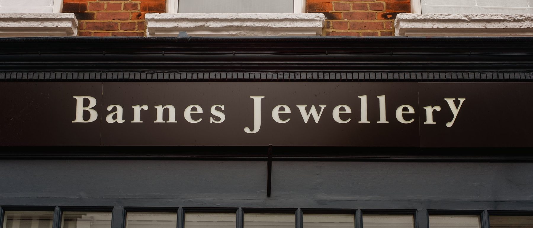 The Barnes Jewellery sign above the shop window on Barnes High Street